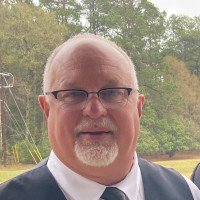 Mark Russell, Lc, Ies