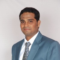 Dinesh M