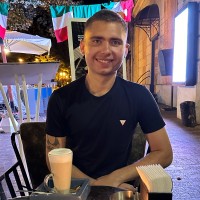 Максим Полищук