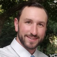 Nicholas A.