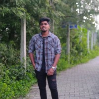Dinesh M