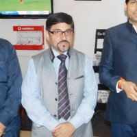 VINOD T.