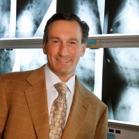 Charles Theofilos, M.D.