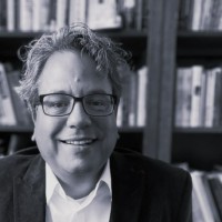 John J White