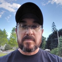 Nicholas E.