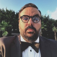 Erhan Saraç, FRICS, REV