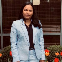 Aruna K.