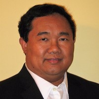 E. Glenn Ymana