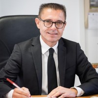 Chris M. Simon