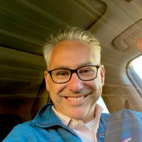 Travis J. Devine