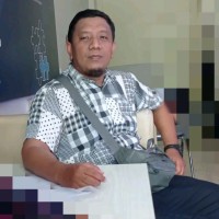 Tumpal T Pangaribuan