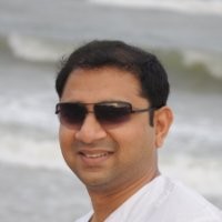 Dr. Tilak Kola