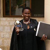 Dr.Sheila McKenzie,RDH, Ph.D,IMD,HD, OM,DHS.