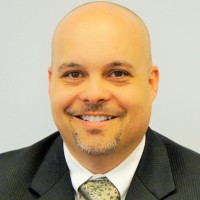 Andrew E.
