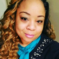 Monique E. Young