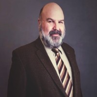 B. John Barrett, K.C.