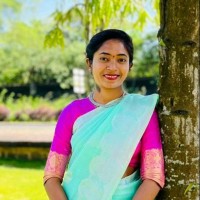 Arati B