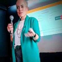 Cláudia Costa (she/her)