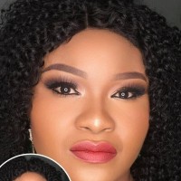 Busola Adegbaju. Phd (I.V), M Ed,  M.A , MDip