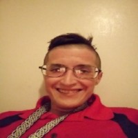 Adam C M.