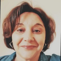 Corinne M
