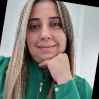 Dra. Flávia Oliveira
