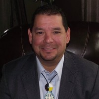Frank Meness, M.A., J.D.