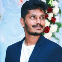 Dinesh E