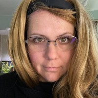 Jamie E. Reustle