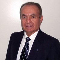 Carlos  E. Arce