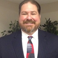 Greg Austin