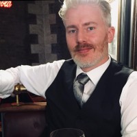 Travis Carlson, C.D.
