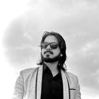 Naveen R