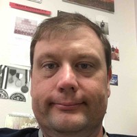 Dr. Travis Matthews