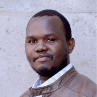 Andrew Ratanya-(Ph.D., Mphil-Theo., Mphil-Hr., Bd).