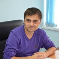 Роман Олейник