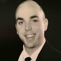 Kyle Odom, CPCU, AIC-M