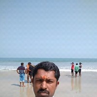 Dinesh M