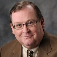 Bruce E. Dumdei, Phd