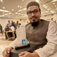 Tahir Hussain-马坚