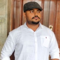 Purushothama P