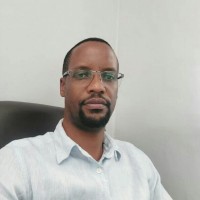 Tabo Sianga, BBA, MBA, PhD (in progress)