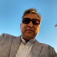 Warren Ali