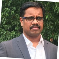 Suresh E.