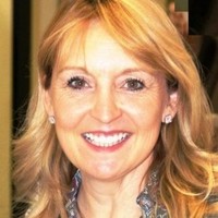 Angela Woods, Mba