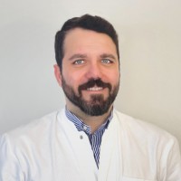 Dr. Husam Slim