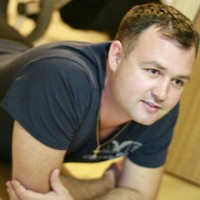 Роман Мельников