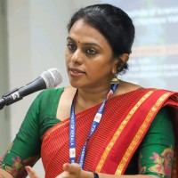 Dr Asha R