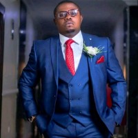 Dr Uba Dennis