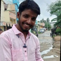 Ezhil E